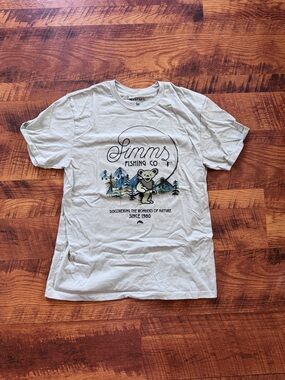 Simms Fishing Co. Light Green Grateful Dead themed tee